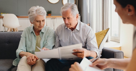 older couple reviewing documents